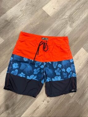 Oakley Men’s Orange, Blue and Navy Floral Colorblock Swim Shorts